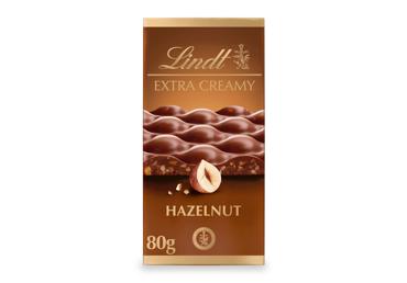 Pieninis šokoladas LINDT EXTRA CREAMY su lazdynų riešutais, 80 g