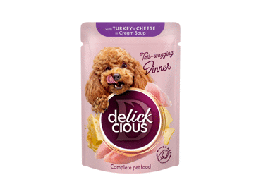 Delickcious™ „Juostelės su kalakutiena ir sūriu kreminėje sriuboje” visavertis konservuotas pašaras suaugusiems šunims, 85 gr
